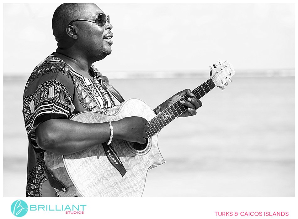 Correy Forbes playing guitar in North Caicos