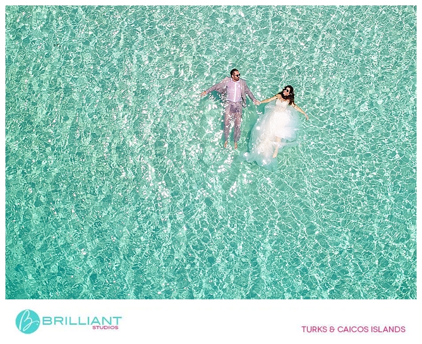 aerial image of bride and groom on grace bay 