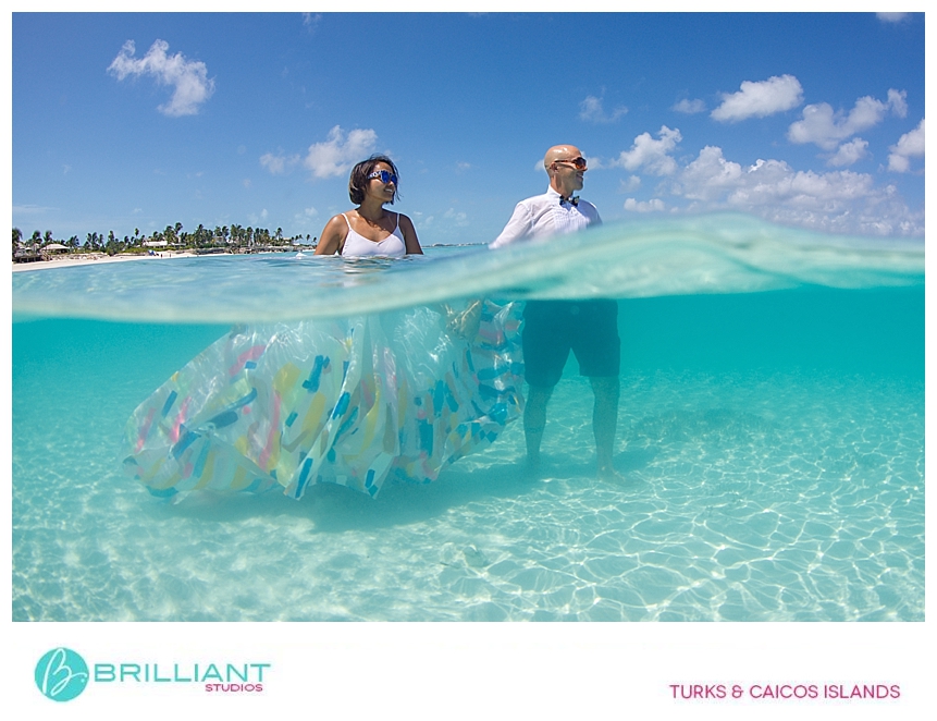 wedding couple inside the water while doing a photo shoot in turks and caicos 